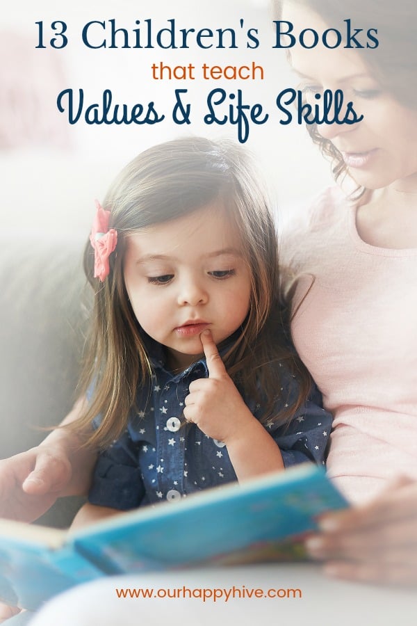 Preschooler sitting on mom's lap reading a book with Text - 13 Children's Books That Teach Values & Life Skills
