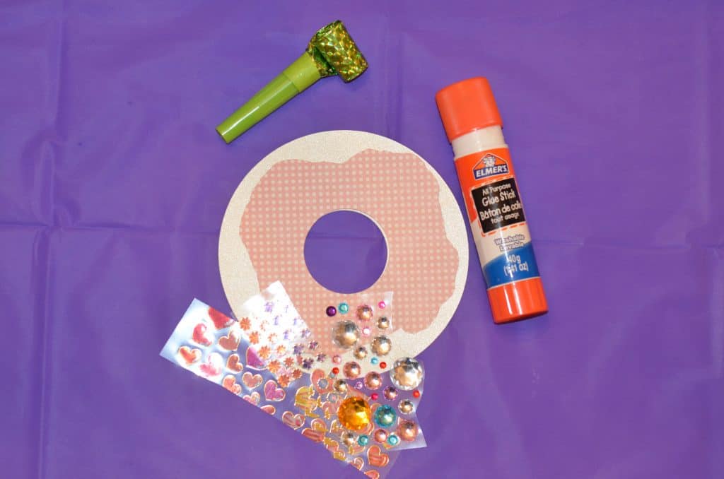 Decorate your own doughnut craft with stickers and glue