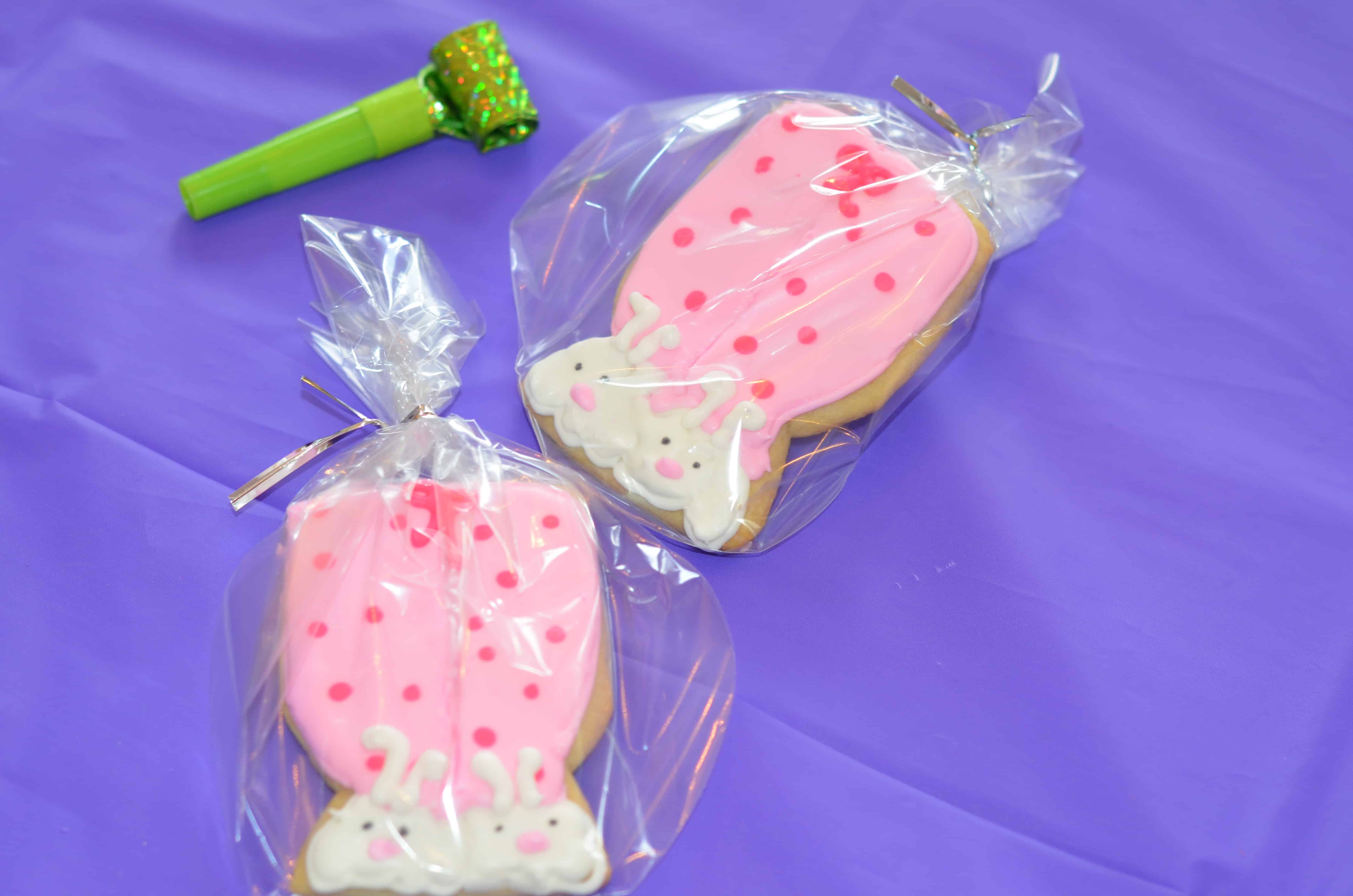 custom pajamas with bunny slippers sugar cookies as party favors for guests