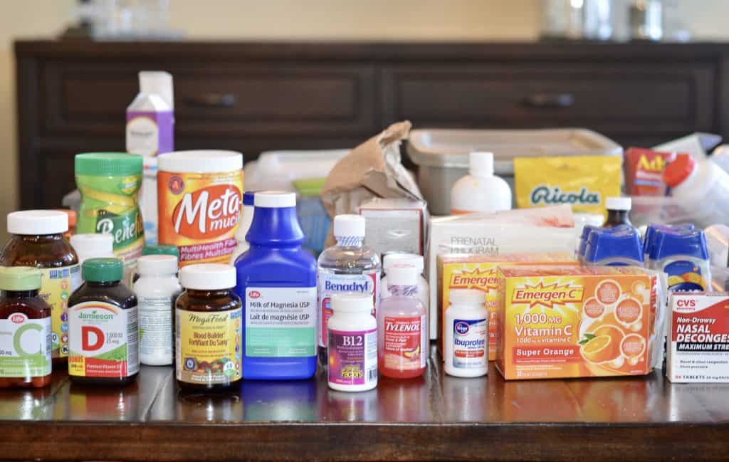 Display of all medicines from cabinet on a table