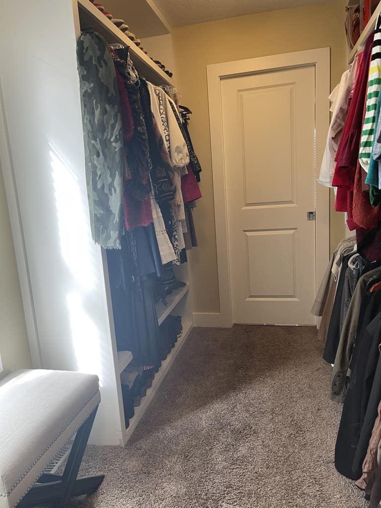 Organized closet with a cleared floor.