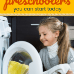 Young girl pulling towels out fo the dryer with text Chores for Preschoolers you can start today