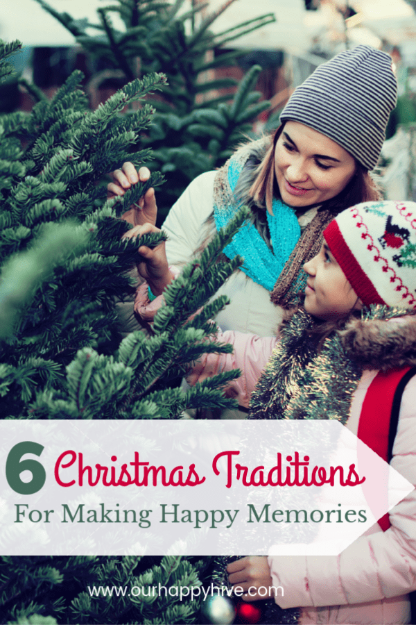 Mom and daughter picking out a Christmas Tree