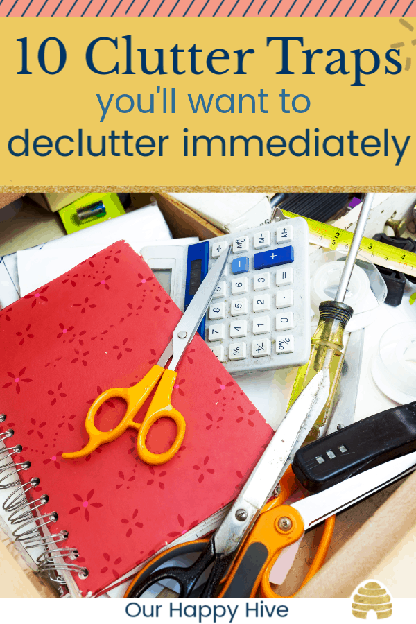 Junk Drawer filled with clutter with text 10 clutter traps you'll want to declutter immediately