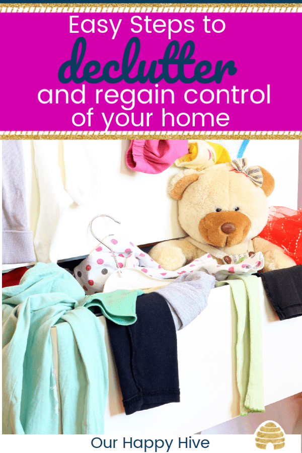 Messy child room with clothes in the drawer with text Declutter and regain control of your home