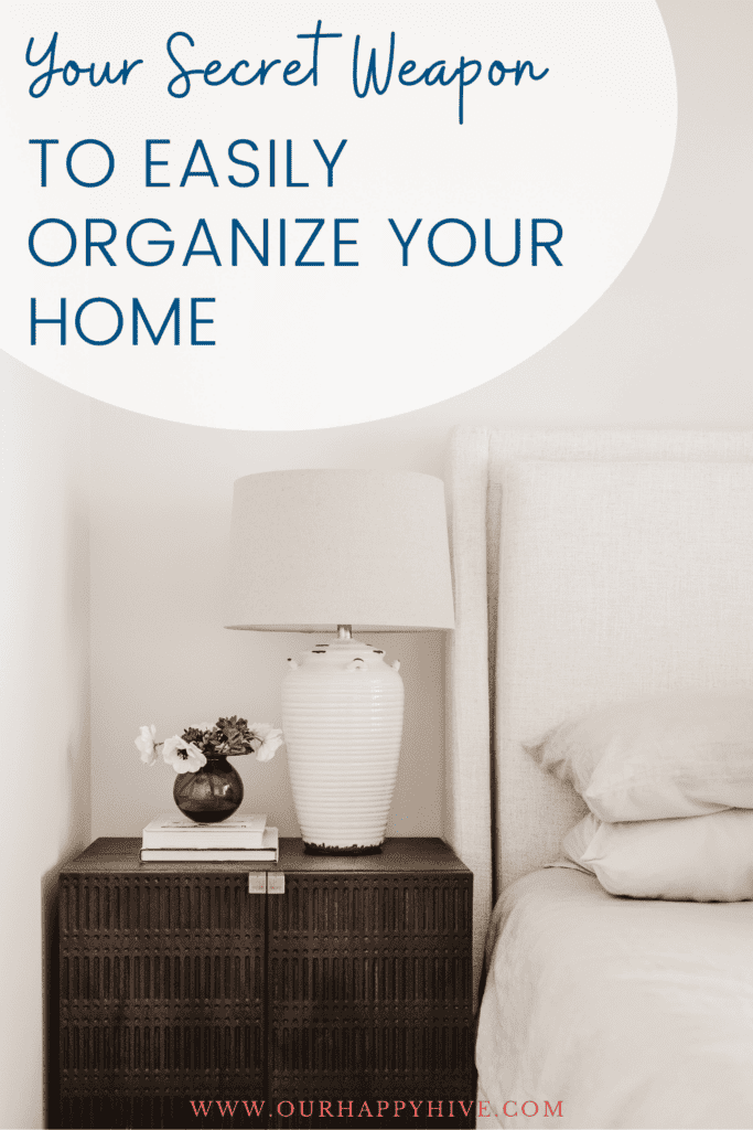 Tidy bedroom with a white bed and cleared off night stand with text Your Secret Weapon to Easily Organize Your Home.