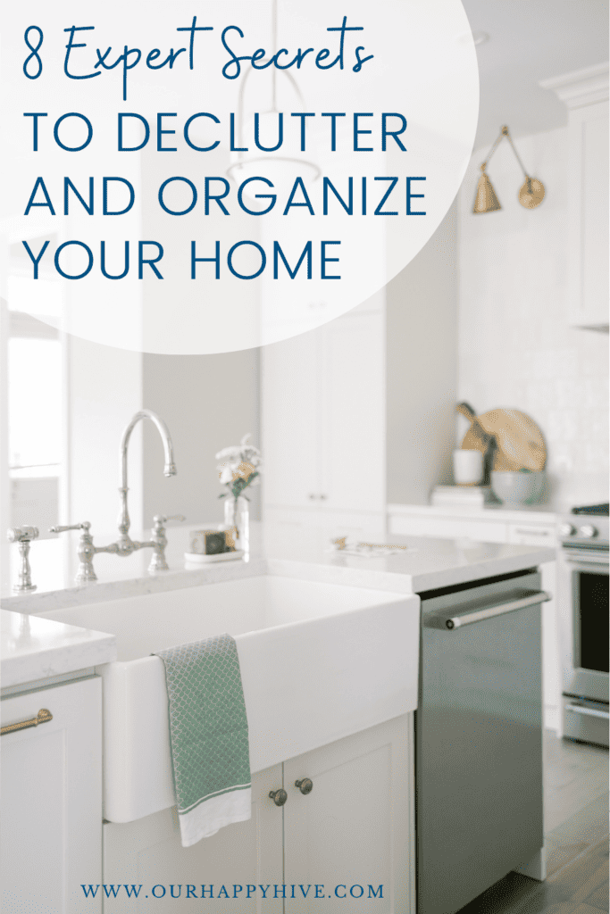 Organized and decluttered white kitchen with text 8 expert secrets to declutter and organize your home.