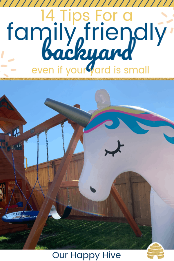 Unicorn Sprinker in Famiy Friendly Backyard next to swingset.