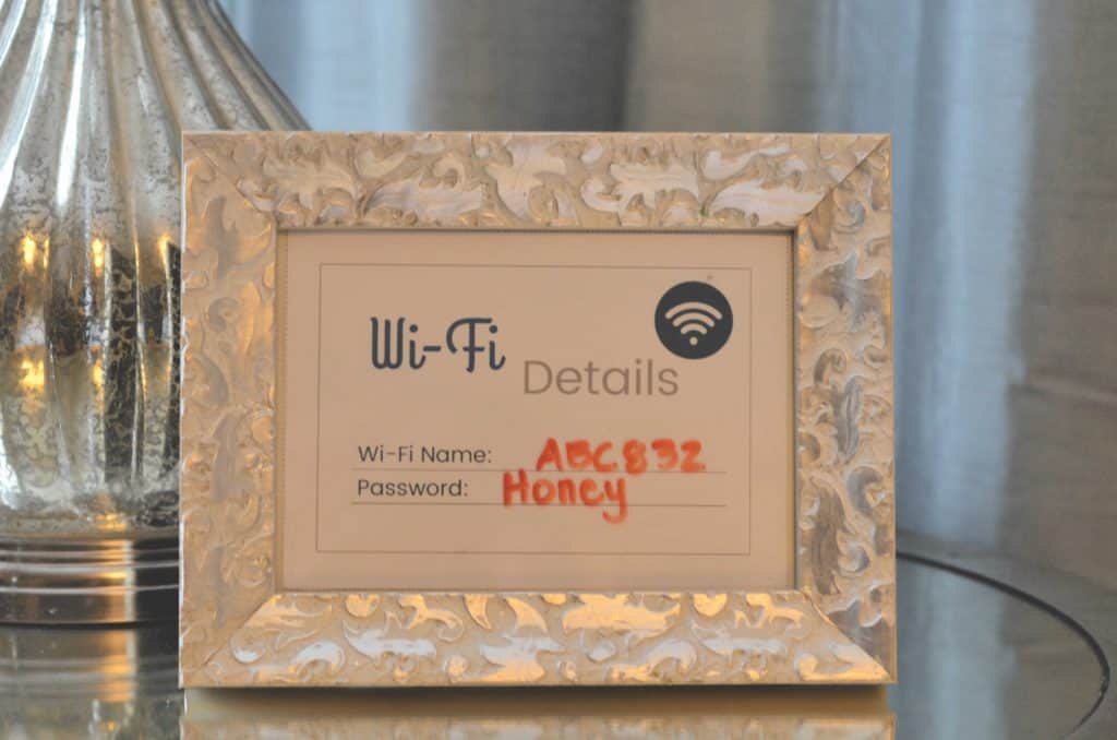 Close Up of a Frame with the Home's wi-fi Details on it for guests.