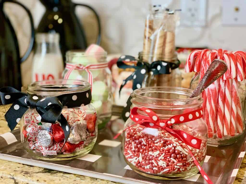 Toppings like sprinkles displayed for a DIY Coffee and Hot Chocolate bar