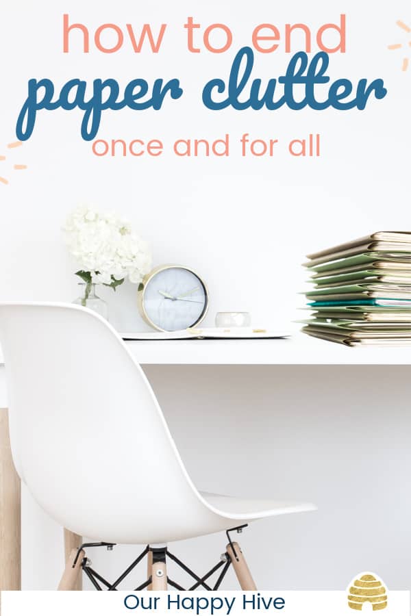 Picture of a tidy desk with a stack of organized paperwork on the corner and text how to end paper clutter once and for all.