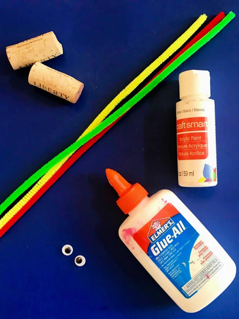 corks, pipecleaners, paint, and google eyes - supplies for snowmen