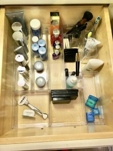 make up organized in dollar store acrylic container