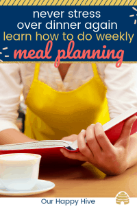 Woman looking at a cookbook doing her weekly meal planning. with text never stress over dinner again learn how to do weekly meal planning