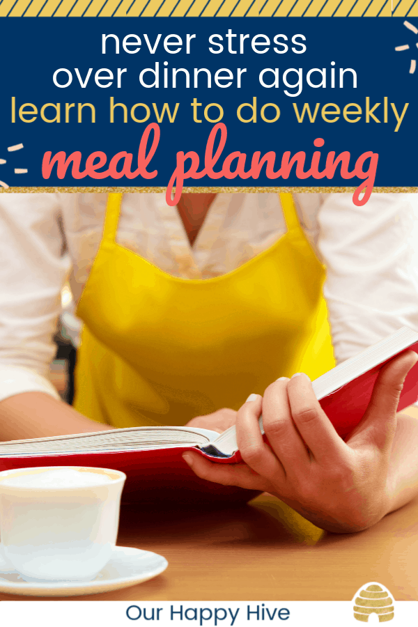 Woman looking at a cookbook doing her weekly meal planning. with text never stress over dinner again learn how to do weekly meal planning