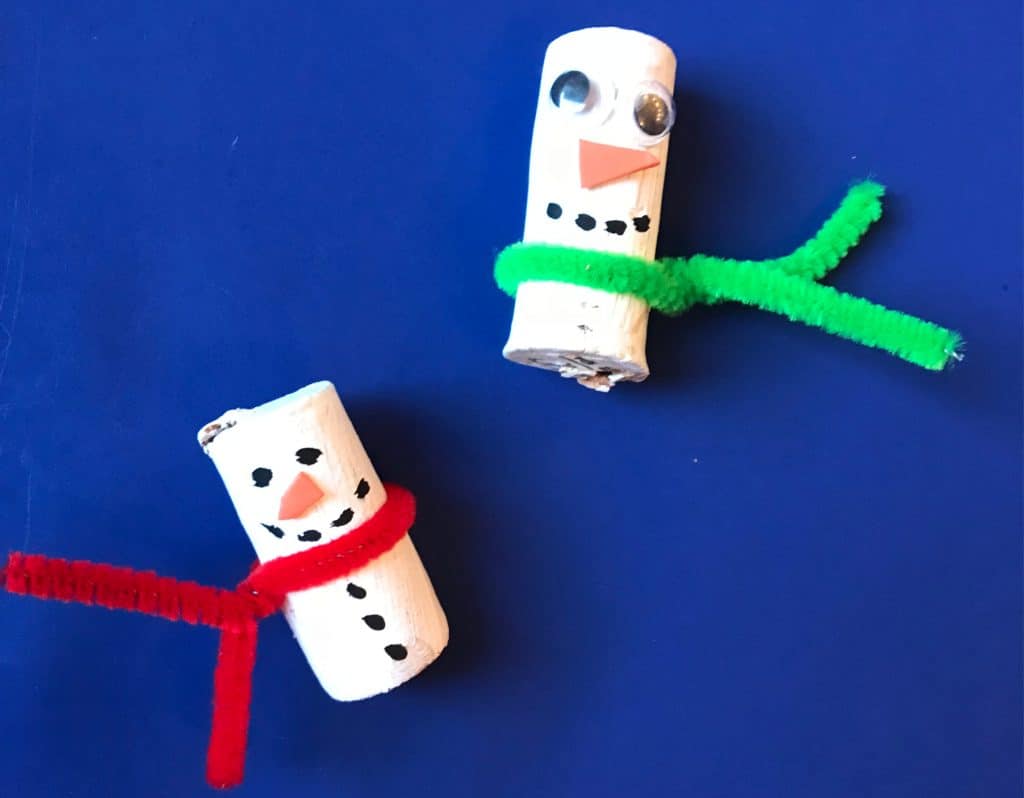 Painted corks with pipecleaners to look like snowmen with scarfs